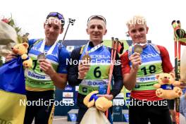 23.08.2024, Otepaeae, Estonia (EST): Artem Tyshchenko (UKR), Dmytro Pidruchnyi (UKR), Tomas Mikyska (CZE), (l-r) - IBU Summer Biathlon World Championships, super sprint men, Otepaeae (EST). www.nordicfocus.com. © Manzoni/NordicFocus. Every downloaded picture is fee-liable.