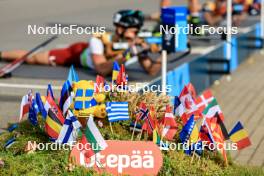 23.08.2024, Otepaeae, Estonia (EST): Otepaeae sign and flags Event Feature: - IBU Summer Biathlon World Championships, super sprint men, Otepaeae (EST). www.nordicfocus.com. © Manzoni/NordicFocus. Every downloaded picture is fee-liable.