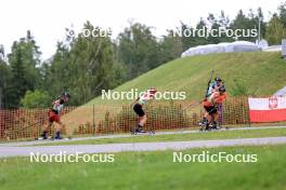 23.08.2024, Otepaeae, Estonia (EST): Renars Birkentals (LAT), Mikulas Karlik (CZE), Tomasz Jakiela (POL), (l-r) - IBU Summer Biathlon World Championships, super sprint men, Otepaeae (EST). www.nordicfocus.com. © Manzoni/NordicFocus. Every downloaded picture is fee-liable.