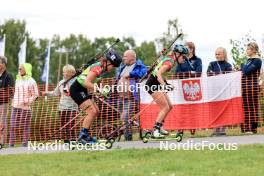 23.08.2024, Otepaeae, Estonia (EST): Kamila Zuk (POL), Natalia Sidorowicz (POL), (l-r) - IBU Summer Biathlon World Championships, super sprint women, Otepaeae (EST). www.nordicfocus.com. © Manzoni/NordicFocus. Every downloaded picture is fee-liable.