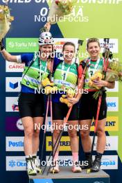 23.08.2024, Otepaeae, Estonia (EST): Suvi Minkkinen (FIN), Paulina Batovska Fialkova (SVK), Lucie Charvatova (CZE), (l-r) - IBU Summer Biathlon World Championships, super sprint women, Otepaeae (EST). www.nordicfocus.com. © Manzoni/NordicFocus. Every downloaded picture is fee-liable.