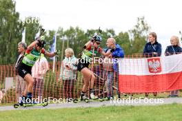 23.08.2024, Otepaeae, Estonia (EST): Kamila Zuk (POL), Natalia Sidorowicz (POL), (l-r) - IBU Summer Biathlon World Championships, super sprint women, Otepaeae (EST). www.nordicfocus.com. © Manzoni/NordicFocus. Every downloaded picture is fee-liable.