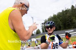 21.08.2024, Otepaeae, Estonia (EST): Juraj Sanitra (SVK), coach Team Ukraine, Dmytro Pidruchnyi (UKR) - IBU Summer Biathlon World Championships, training, Otepaeae (EST). www.nordicfocus.com. © Manzoni/NordicFocus. Every downloaded picture is fee-liable.