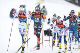 06.01.2024, Val di Fiemme, Italy (ITA): Victoria Carl (GER), Frida Karlsson (SWE), (l-r)  - FIS world cup cross-country, tour de ski, mass, Val di Fiemme (ITA). www.nordicfocus.com. © Modica/NordicFocus. Every downloaded picture is fee-liable.