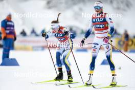 21.01.2024, Oberhof, Germany (GER): Ebba Andersson (SWE), Frida Karlsson (SWE), (l-r)  - FIS world cup cross-country, relay, Oberhof (GER). www.nordicfocus.com. © Modica/NordicFocus. Every downloaded picture is fee-liable.