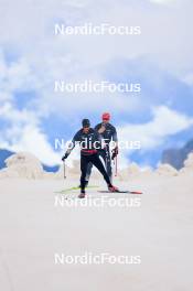 22.06.2024, Les Diablerets, Switzerland (SUI): Jonas Baumann (SUI), Erik Braten Guidon (NOR), coach Team Switzerland, (l-r) - Cross-Country summer training on the Glacier 3000, Les Diablerets (SUI). www.nordicfocus.com. © Manzoni/NordicFocus. Every downloaded picture is fee-liable.