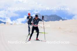 22.06.2024, Les Diablerets, Switzerland (SUI): Jonas Baumann (SUI), Erik Braten Guidon (NOR), coach Team Switzerland, (l-r) - Cross-Country summer training on the Glacier 3000, Les Diablerets (SUI). www.nordicfocus.com. © Manzoni/NordicFocus. Every downloaded picture is fee-liable.