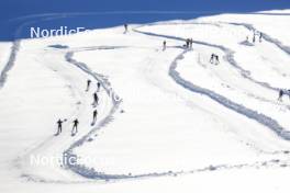 14.10.2024, Ramsau am Dachstein, Austria (AUT): Undefined athletes compete on the glacier track - Cross-Country summer training, Dachsteinglacier, Ramsau am Dachstein (AUT). www.nordicfocus.com. © Manzoni/NordicFocus. Every downloaded picture is fee-liable.