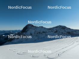 12.10.2024, Ramsau am Dachstein, Austria (AUT): Event Feature: Overview over the Dachstein glacier with the cross-country track in perfect winter conditions - Cross-Country summer training, Dachsteinglacier, Ramsau am Dachstein (AUT). www.nordicfocus.com. © Manzoni/NordicFocus. Every downloaded picture is fee-liable.