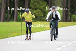 28.05.2024, Lenzerheide, Switzerland (SUI): Jason Rueesch (SUI), Erik Braten Guidon (NOR), coach Team Switzerland, (l-r) - Cross-Country training, Lenzerheide (SUI). www.nordicfocus.com. © Manzoni/NordicFocus. Every downloaded picture is fee-liable.