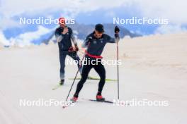 22.06.2024, Les Diablerets, Switzerland (SUI): Jonas Baumann (SUI), Erik Braten Guidon (NOR), coach Team Switzerland, (l-r) - Cross-Country summer training on the Glacier 3000, Les Diablerets (SUI). www.nordicfocus.com. © Manzoni/NordicFocus. Every downloaded picture is fee-liable.