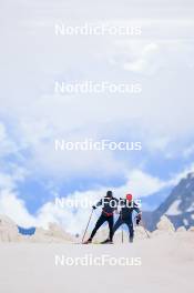 22.06.2024, Les Diablerets, Switzerland (SUI): Jonas Baumann (SUI), Erik Braten Guidon (NOR), coach Team Switzerland, (l-r) - Cross-Country summer training on the Glacier 3000, Les Diablerets (SUI). www.nordicfocus.com. © Manzoni/NordicFocus. Every downloaded picture is fee-liable.