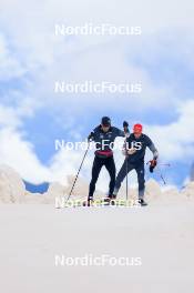 22.06.2024, Les Diablerets, Switzerland (SUI): Jonas Baumann (SUI), Erik Braten Guidon (NOR), coach Team Switzerland, (l-r) - Cross-Country summer training on the Glacier 3000, Les Diablerets (SUI). www.nordicfocus.com. © Manzoni/NordicFocus. Every downloaded picture is fee-liable.