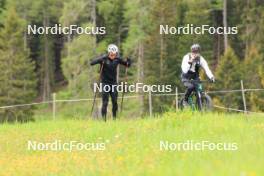 28.05.2024, Lenzerheide, Switzerland (SUI): Janik Riebli (SUI), Erik Braten Guidon (NOR), coach Team Switzerland, (l-r) - Cross-Country training, Lenzerheide (SUI). www.nordicfocus.com. © Manzoni/NordicFocus. Every downloaded picture is fee-liable.