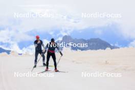 22.06.2024, Les Diablerets, Switzerland (SUI): Jonas Baumann (SUI), Erik Braten Guidon (NOR), coach Team Switzerland, (l-r) - Cross-Country summer training on the Glacier 3000, Les Diablerets (SUI). www.nordicfocus.com. © Manzoni/NordicFocus. Every downloaded picture is fee-liable.