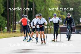 10.09.2024, Lenzerheide, Switzerland (SUI): Valerio Grond (SUI), Jonas Baumann (SUI), Beda Klee (SUI), Erik Braten Guidon (NOR), coach Team Switzerland, (l-r) - Cross-Country training, Lenzerheide (SUI). www.nordicfocus.com. © Manzoni/NordicFocus. Every downloaded picture is fee-liable.