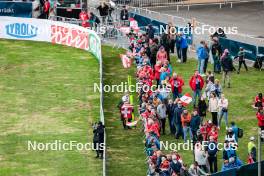 28.09.2024, Hinzenbach, Austria (AUT): Felix Trunz (SUI) standing with the fans - Summer Grand Prix ski jumping, individual HS90, Hinzenbach (AUT). www.nordicfocus.com. © Volk/NordicFocus. Every downloaded picture is fee-liable