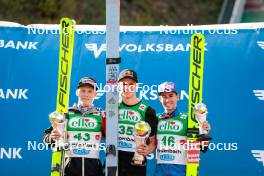 29.09.2024, Hinzenbach, Austria (AUT): Jan Hoerl (AUT), Andreas Wellinger (GER), Stefan Kraft (AUT), (l-r)  - Summer Grand Prix ski jumping, individual HS90, Hinzenbach (AUT). www.nordicfocus.com. © Volk/NordicFocus. Every downloaded picture is fee-liable