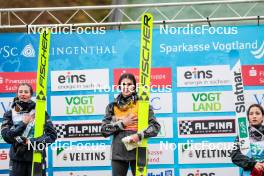 05.10.2024, Klingenthal, Germany (GER): Annika Sieff (ITA), Lara Malsiner (ITA), Sara Takanashi (JPN), (l-r)  - Summer Grand Prix ski jumping women, individual HS140, Klingenthal (GER). www.nordicfocus.com. © Volk/NordicFocus. Every downloaded picture is fee-liable