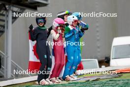 05.10.2024, Klingenthal, Germany (GER): Flagbearing kids  - Summer Grand Prix ski jumping women, individual HS140, Klingenthal (GER). www.nordicfocus.com. © Volk/NordicFocus. Every downloaded picture is fee-liable