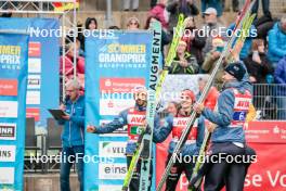 06.10.2024, Klingenthal, Germany (GER): Pius Paschke (GER), Selina Freitag (GER), Andreas Wellinger (GER), (l-r)  - Summer Grand Prix ski jumping, mixed team HS140, Klingenthal (GER). www.nordicfocus.com. © Volk/NordicFocus. Every downloaded picture is fee-liable