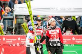 06.10.2024, Klingenthal, Germany (GER): Jacqueline Seifriedsberger (AUT), Jan Hoerl (AUT), Lisa Eder (AUT), (l-r)  - Summer Grand Prix ski jumping, mixed team HS140, Klingenthal (GER). www.nordicfocus.com. © Volk/NordicFocus. Every downloaded picture is fee-liable