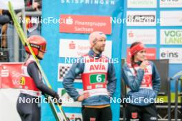 06.10.2024, Klingenthal, Germany (GER): Katharina Schmid (GER), Pius Paschke (GER), Selina Freitag (GER), (l-r)  - Summer Grand Prix ski jumping, mixed team HS140, Klingenthal (GER). www.nordicfocus.com. © Volk/NordicFocus. Every downloaded picture is fee-liable