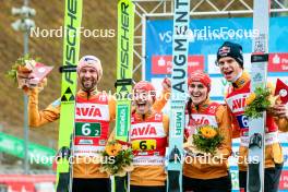 06.10.2024, Klingenthal, Germany (GER): Pius Paschke (GER), Katharina Schmid (GER), Andreas Wellinger (GER), Selina Freitag (GER), (l-r) - Summer Grand Prix ski jumping, mixed team HS140, Klingenthal (GER). www.nordicfocus.com. © Volk/NordicFocus. Every downloaded picture is fee-liable