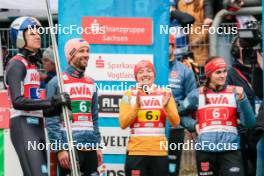 06.10.2024, Klingenthal, Germany (GER): Andreas Wellinger (GER), Pius Paschke (GER), Katharina Schmid (GER), Selina Freitag (GER), (l-r)  - Summer Grand Prix ski jumping, mixed team HS140, Klingenthal (GER). www.nordicfocus.com. © Volk/NordicFocus. Every downloaded picture is fee-liable