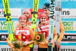 06.10.2024, Klingenthal, Germany (GER): Katharina Schmid (GER), Pius Paschke (GER), Selina Freitag (GER), Andreas Wellinger (GER), (l-r)  - Summer Grand Prix ski jumping, mixed team HS140, Klingenthal (GER). www.nordicfocus.com. © Volk/NordicFocus. Every downloaded picture is fee-liable