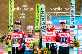 06.10.2024, Klingenthal, Germany (GER): Jan Hoerl (AUT), Jacqueline Seifriedsberger (AUT), Lisa Eder (AUT), Daniel Tschofenig (AUT), (l-r) - Summer Grand Prix ski jumping, mixed team HS140, Klingenthal (GER). www.nordicfocus.com. © Volk/NordicFocus. Every downloaded picture is fee-liable