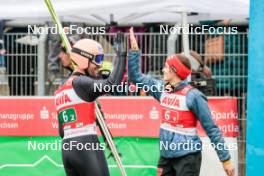 06.10.2024, Klingenthal, Germany (GER): Pius Paschke (GER), Selina Freitag (GER), (l-r)  - Summer Grand Prix ski jumping, mixed team HS140, Klingenthal (GER). www.nordicfocus.com. © Volk/NordicFocus. Every downloaded picture is fee-liable