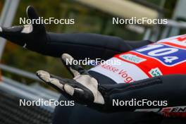 06.10.2024, Klingenthal, Germany (GER): Gloves  - Summer Grand Prix ski jumping, mixed team HS140, Klingenthal (GER). www.nordicfocus.com. © Volk/NordicFocus. Every downloaded picture is fee-liable