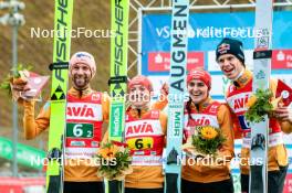 06.10.2024, Klingenthal, Germany (GER): Pius Paschke (GER), Katharina Schmid (GER), Andreas Wellinger (GER), Selina Freitag (GER), (l-r) - Summer Grand Prix ski jumping, mixed team HS140, Klingenthal (GER). www.nordicfocus.com. © Volk/NordicFocus. Every downloaded picture is fee-liable