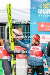 06.10.2024, Klingenthal, Germany (GER): Pius Paschke (GER), Selina Freitag (GER), (l-r)  - Summer Grand Prix ski jumping, mixed team HS140, Klingenthal (GER). www.nordicfocus.com. © Volk/NordicFocus. Every downloaded picture is fee-liable