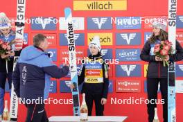 03.01.2024, Villach, Austria (AUT): Eva Pinkelnig (AUT), Nika Prevc (SLO), Abigail Strate (CAN), (l-r) - FIS world cup ski jumping women, individual HS98, Villach (AUT). www.nordicfocus.com. © Barbieri/NordicFocus. Every downloaded picture is fee-liable.