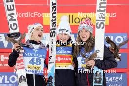 03.01.2024, Villach, Austria (AUT): Eva Pinkelnig (AUT), Nika Prevc (SLO), Abigail Strate (CAN), (l-r) - FIS world cup ski jumping women, individual HS98, Villach (AUT). www.nordicfocus.com. © Barbieri/NordicFocus. Every downloaded picture is fee-liable.