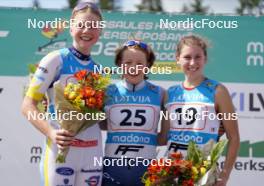 17.07.2024, Madona, Latvia (LAT): Flower ceremony, Johanna Holmberg (SWE),  Anna Maria Ghiddi (ITA), Daryna Myhal (UKR) - FIS Rollerski World Cup, interval, Madona (LAT). www.nordicfocus.com. © Koksarovs/NordicFocus. Every downloaded picture is fee-liable.