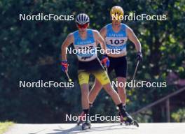 17.07.2024, Madona, Latvia (LAT): Gustavs Sinats (LAT), Sebastian Endrestad (CHI) - FIS Rollerski World Cup, interval, Madona (LAT). www.nordicfocus.com. © Koksarovs/NordicFocus. Every downloaded picture is fee-liable.