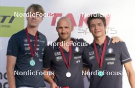 18.07.2024, Madona, Latvia (LAT): Medal ceremony, Martin Himma (EST), Matteo Tanel (ITA), Lorenzo Riccardo Masiero (ITA) - FIS Rollerski World Cup, interval, Madona (LAT). www.nordicfocus.com. © Koksarovs/NordicFocus. Every downloaded picture is fee-liable.