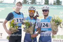 17.07.2024, Madona, Latvia (LAT): Flower ceremony, Martin Himma (EST), Matteo Tanel (ITA), Lorenzo Riccardo Masiero (ITA) - FIS Rollerski World Cup, interval, Madona (LAT). www.nordicfocus.com. © Koksarovs/NordicFocus. Every downloaded picture is fee-liable.