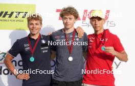 18.07.2024, Madona, Latvia (LAT): Medal ceremony, Carlo Cantaloni (ITA), Jonatan Lindberg (SWE), Davis Kalnins (LAT) - FIS Rollerski World Cup, interval, Madona (LAT). www.nordicfocus.com. © Koksarovs/NordicFocus. Every downloaded picture is fee-liable.