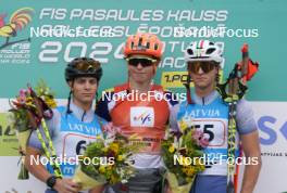 21.07.2024, Madona, Latvia (LAT): Flower ceremony,  Tommaso Tozzi (ITA), Jonatan Lindberg (SWE), Stefano Epis (ITA) - FIS Rollerski World Cup, mass, Madona (LAT). www.nordicfocus.com. © Koksarovs/NordicFocus. Every downloaded picture is fee-liable.