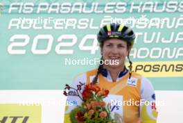 20.07.2024, Madona, Latvia (LAT): Flower ceremony,  Linn Soemskar (SWE),  - FIS Rollerski World Cup, sprint, Madona (LAT). www.nordicfocus.com. © Koksarovs/NordicFocus. Every downloaded picture is fee-liable.