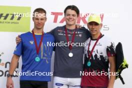 20.07.2024, Madona, Latvia (LAT): Medal ceremony, Bohdan Nikulin (UKR), Ville Jutterdal (SWE), Davis Kalnins (LAT) - FIS Rollerski World Cup, sprint, Madona (LAT). www.nordicfocus.com. © Koksarovs/NordicFocus. Every downloaded picture is fee-liable.