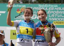 18.07.2024, Madona, Latvia (LAT): Flower ceremony,  Linn Soemskar (SWE), Ebba Stenman (SWE) - FIS Rollerski World Cup, team sprint, Madona (LAT). www.nordicfocus.com. © Koksarovs/NordicFocus. Every downloaded picture is fee-liable.