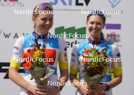 18.07.2024, Madona, Latvia (LAT): Flower ceremony,   Johanna Holmberg (SWE), Ella Selmosson (SWE) - FIS Rollerski World Cup, team sprint, Madona (LAT). www.nordicfocus.com. © Koksarovs/NordicFocus. Every downloaded picture is fee-liable.