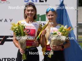 18.07.2024, Madona, Latvia (LAT): Flower ceremony, Mariia Pavlenko (UKR), Yevheniia Murach (UKR),  - FIS Rollerski World Cup, team sprint, Madona (LAT). www.nordicfocus.com. © Koksarovs/NordicFocus. Every downloaded picture is fee-liable.