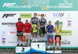 18.07.2024, Madona, Latvia (LAT): Medal ceremony,  Jekabs Skolnieks (LAT), Davis Kalnins (LAT), Ville Jutterdal (SWE), Jonahan Lindberg (SWE), Bohdan Nikulin (UKR), Nazarii Teselskyi (UKR) - FIS Rollerski World Cup, team sprint, Madona (LAT). www.nordicfocus.com. © Koksarovs/NordicFocus. Every downloaded picture is fee-liable.