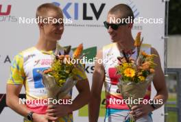 18.07.2024, Madona, Latvia (LAT): Flower ceremony,   Bohdan Nikulin (UKR), Nazarii Teselskyi (UKR) - FIS Rollerski World Cup, team sprint, Madona (LAT). www.nordicfocus.com. © Koksarovs/NordicFocus. Every downloaded picture is fee-liable.